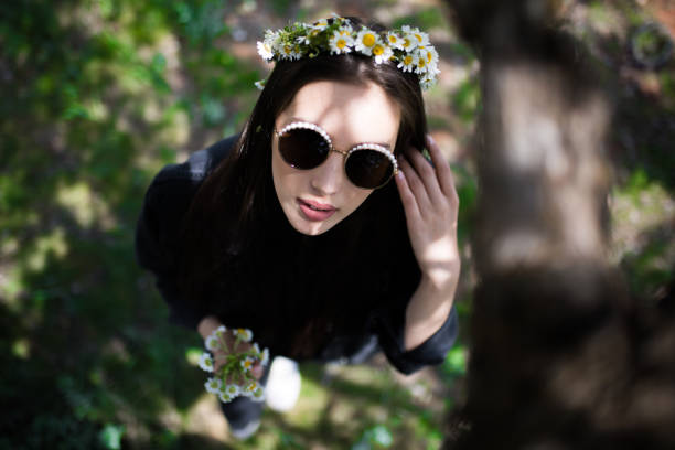 female model photography between flowers