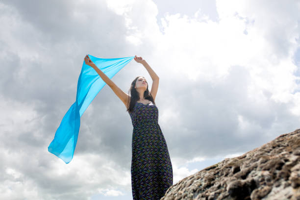 istock woman meditating in nature 1089846962