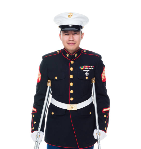 istock US Marine in uniform with cruches 1089851778