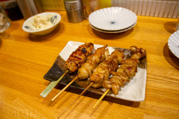 焼き鳥 - spit roasted 日本食 焼き鳥 japanese culture ストックフォトと画像