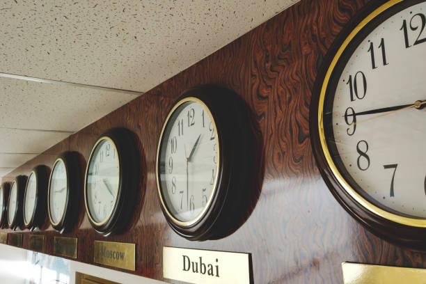 istock clock with world time on the exchange, retro toned 1089853458