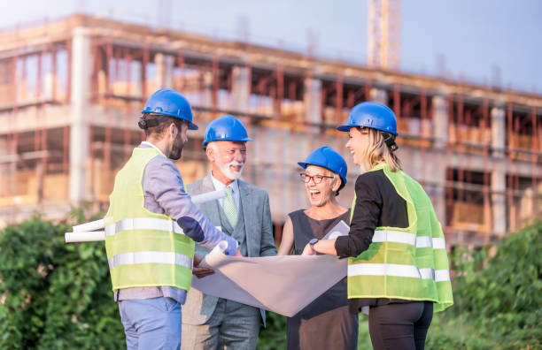 istock Investors and architects on a construction site. 1089856900
