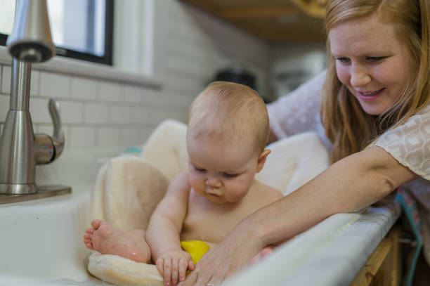 istock Bath time in the kitchen sink 1089860074