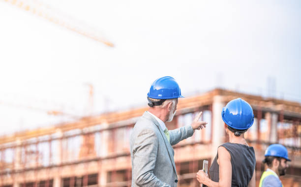 istock Unrecognizable senior investors making plans on a construction site. 1089863796