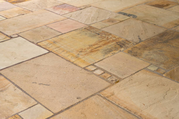 istock Lime sandstone slabs laid irregularly on the terrace 1089883372