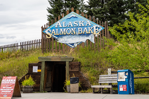 Fairbanks, Alaska - August 11, 2018: Sign for the Alaskan Salmon Bake in Pioneer Park, a nightly buffet serving fish and other food during summer