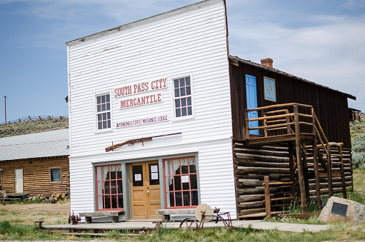 South Pass, Wyoming - July 11, 2018: South Pass City Mercantile, Wyoming's First Masonic Lodge, sits abandoned in the ghost town on a sunny summer day