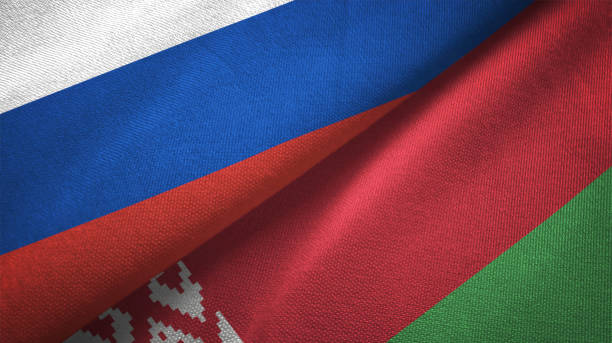 belarus and russia two flags together realations textile cloth fabric texture - belarus imagens e fotografias de stock