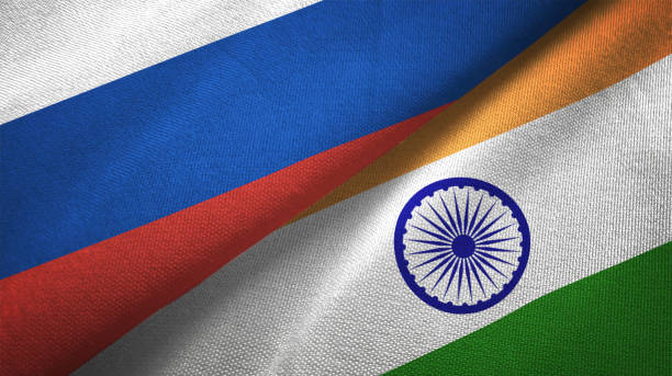 inde et russie deux drapeaux realations ensemble textile tissu tissu texture - fédération de russie photos et images de collection