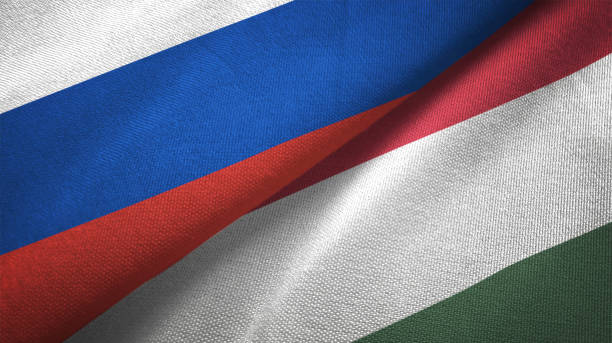 ungheria e russia due bandiere insieme realizzano tessuto tessuto texture - hungarian flag foto e immagini stock