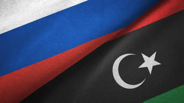 Photo of Libya and Russia two flags together realations textile cloth fabric texture