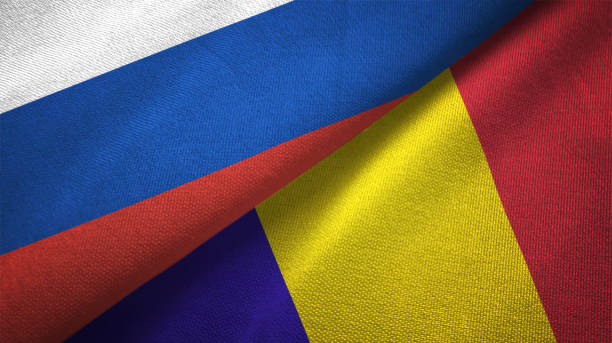 istock Romania and Russia two flags together realations textile cloth fabric texture 1089911214