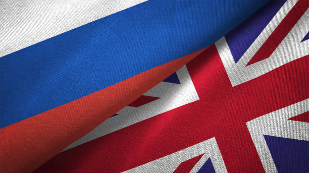 istock United Kingdom and Russia two flags together realations textile cloth fabric texture 1089911574