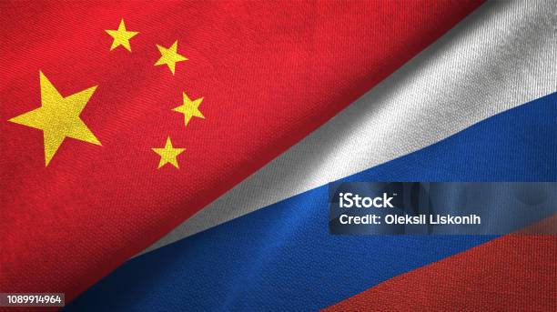 Russia And China Two Flags Together Realations Textile Cloth Fabric Texture - Fotografias de stock e mais imagens de China