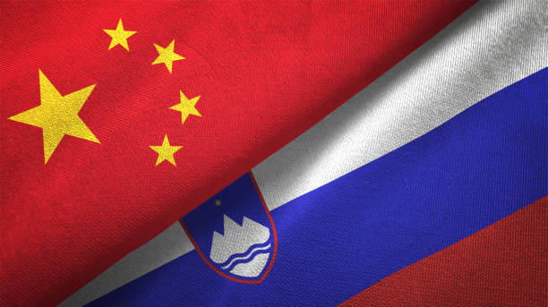 istock Slovenia and China two flags together realations textile cloth fabric texture 1089915114