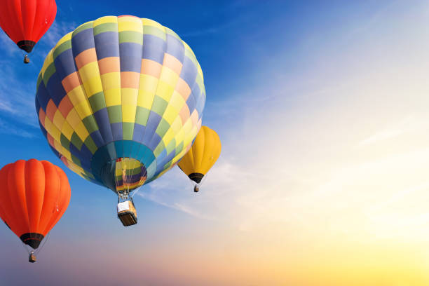 istock Colorful balloons floating in the sky at sunset. 1089915268