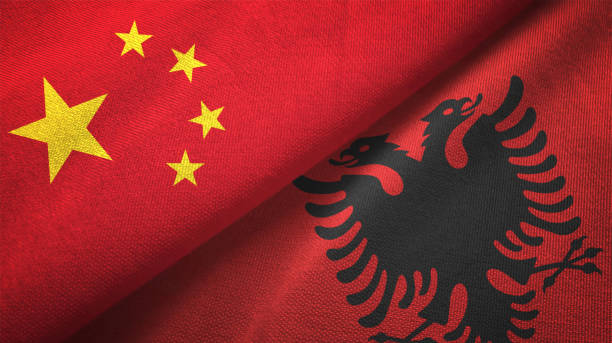 istock Albania and China two flags together realations textile cloth fabric texture 1089915332
