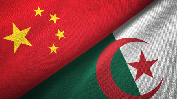 istock Algeria and China two flags together realations textile cloth fabric texture 1089915336
