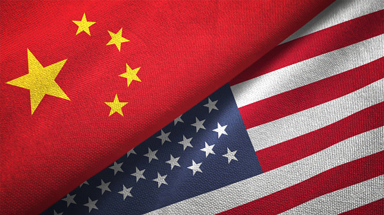 Estados Unidos y China dos banderas juntos relaciones textil tela textura de la tela photo