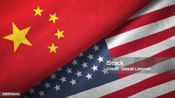 United States And China Two Flags Together Realations Textile Cloth Fabric Texture Stock Photo - Download Image Now