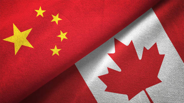 istock Canada and China two flags together realations textile cloth fabric texture 1089916658