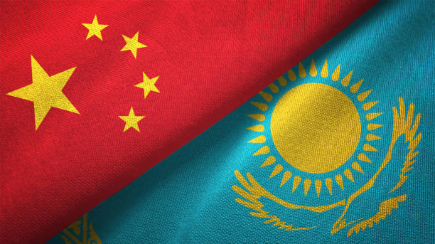 Kazakhstan and China two flags together realations textile cloth fabric texture Kazakhstan and China flag together realtions textile cloth fabric texture kazakhstan stock pictures, royalty-free photos & images
