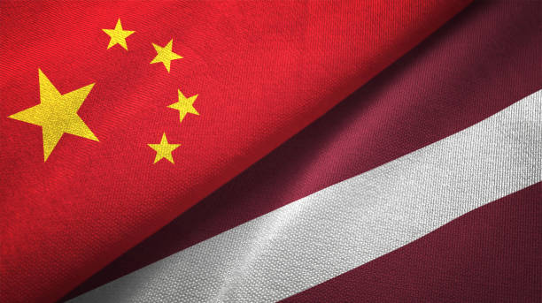 istock Latvia and China two flags together realations textile cloth fabric texture 1089917052