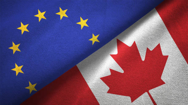 istock Canada and European Union two flags together realations textile cloth fabric texture 1089920076