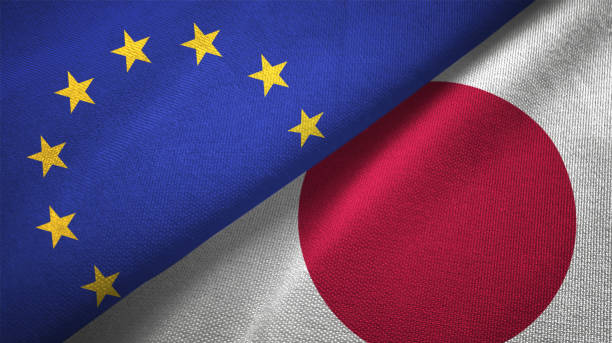 japón y la unión europea dos banderas juntos relaciones textil tela textura de la tela - japanese flag fotos fotografías e imágenes de stock