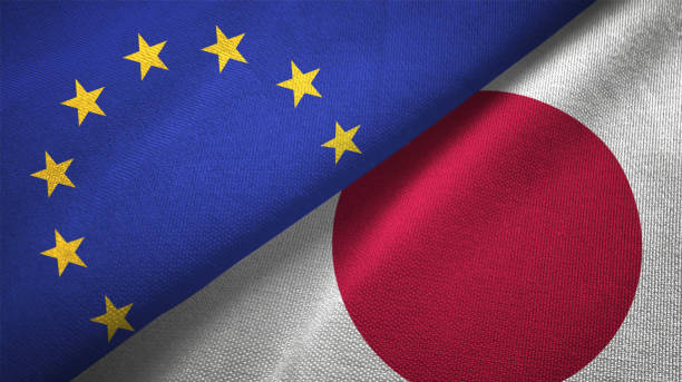 istock Japan and European Union two flags together realations textile cloth fabric texture 1089920446