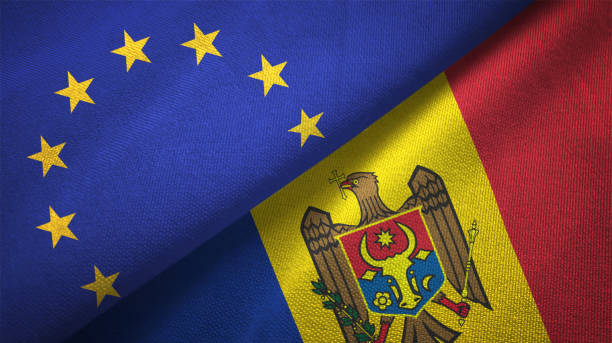Moldova and European Union two flags together realations textile cloth fabric texture Moldova and European Union flag together realtions textile cloth fabric texture moldova stock pictures, royalty-free photos & images