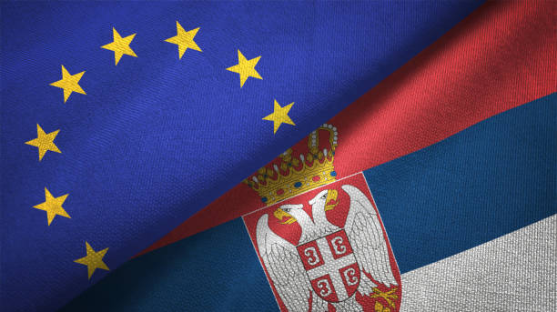 Serbia and European Union two flags together realations textile cloth fabric texture Serbia and European Union flag together realtions textile cloth fabric texture serbia stock pictures, royalty-free photos & images