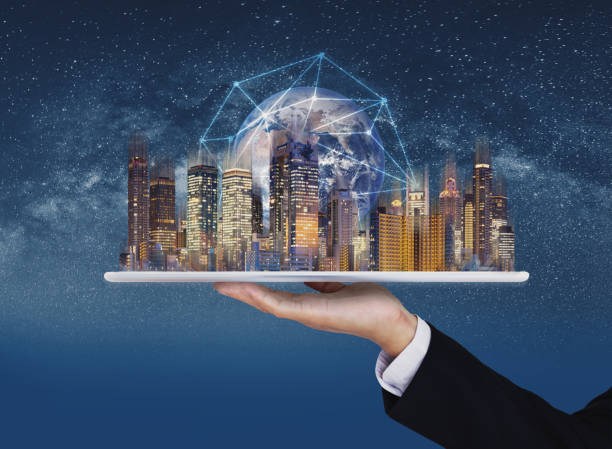 Hands holding digital tablet with modern buildings global network connection technology hologram. Element of this image are furnished by NASA
