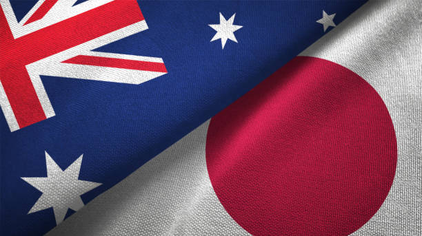japón y australia dos banderas juntos relaciones textil tela textura de la tela - japanese flag fotos fotografías e imágenes de stock