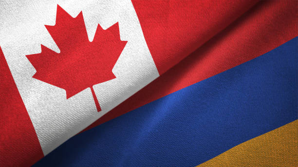 istock Armenia and Canada two flags together realations textile cloth fabric texture 1089929870