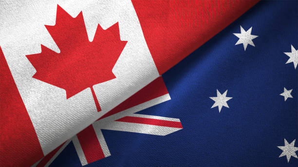 istock Australia and Canada two flags together realations textile cloth fabric texture 1089929874