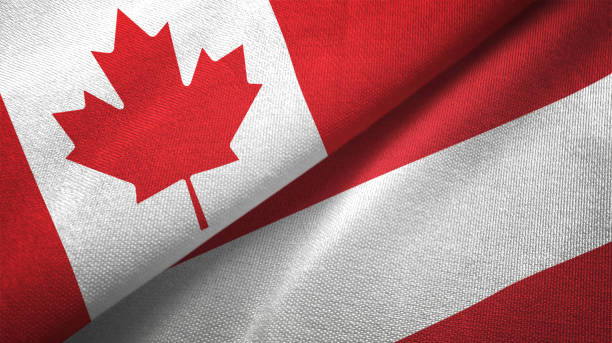 istock Austria and Canada two flags together realations textile cloth fabric texture 1089929880