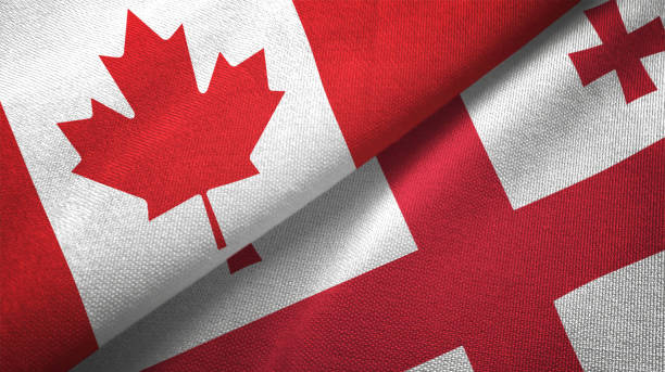 istock Georgia and Canada two flags together realations textile cloth fabric texture 1089930140