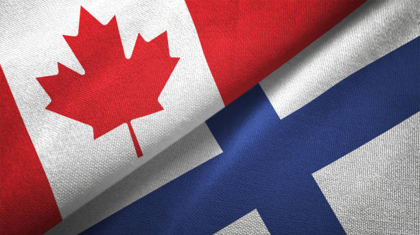 istock Finland and Canada two flags together realations textile cloth fabric texture 1089930176