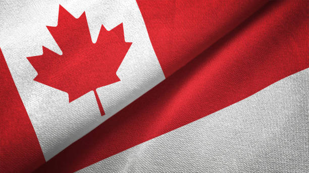 istock Indonesia and Canada two flags together realations textile cloth fabric texture 1089930300