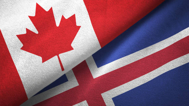 istock Iceland and Canada two flags together realations textile cloth fabric texture 1089930312