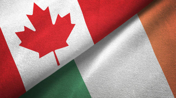 istock Ireland and Canada two flags together realations textile cloth fabric texture 1089930324