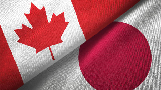 istock Japan and Canada two flags together realations textile cloth fabric texture 1089930360