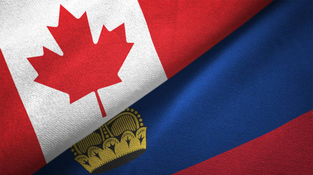 istock Liechtenstein and Canada two flags together realations textile cloth fabric texture 1089930450