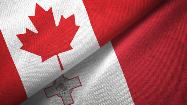 istock Malta and Canada two flags together realations textile cloth fabric texture 1089930578