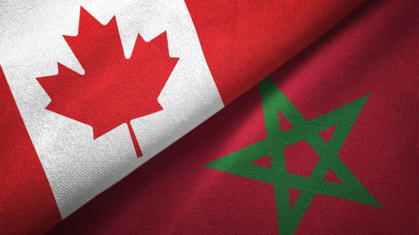 istock Morocco and Canada two flags together realations textile cloth fabric texture 1089930668