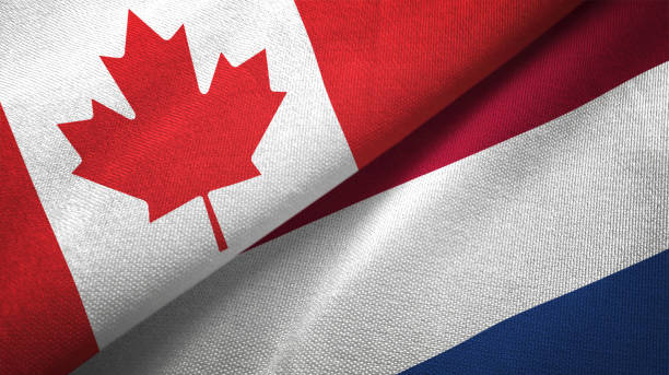 istock Netherlands and Canada two flags together realations textile cloth fabric texture 1089930696