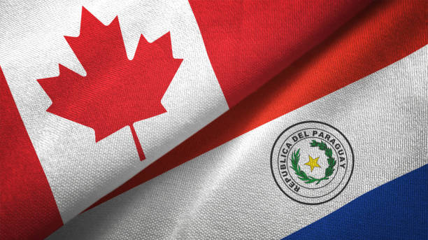 istock Paraguay and Canada two flags together realations textile cloth fabric texture 1089930716