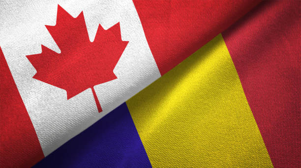 istock Romania and Canada two flags together realations textile cloth fabric texture 1089930772
