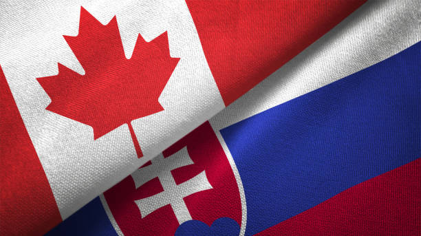 istock Slovakia and Canada two flags together realations textile cloth fabric texture 1089930888
